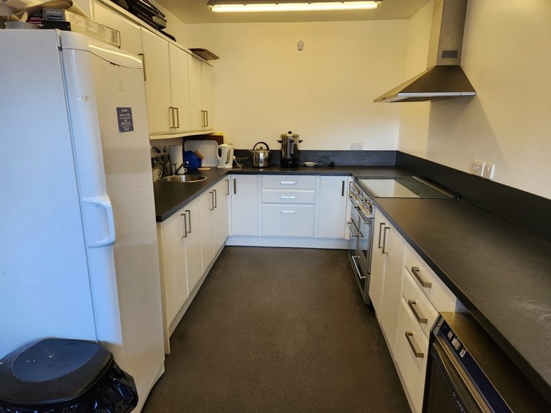 The well equipped village hall kitchen is accessed from the reading room.
