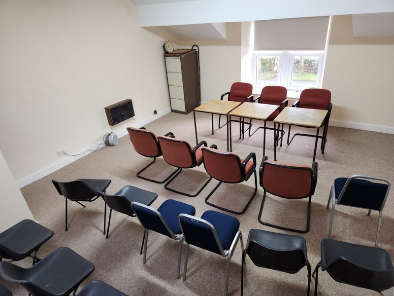 The upstairs meeting room with seating for up to twenty five persons