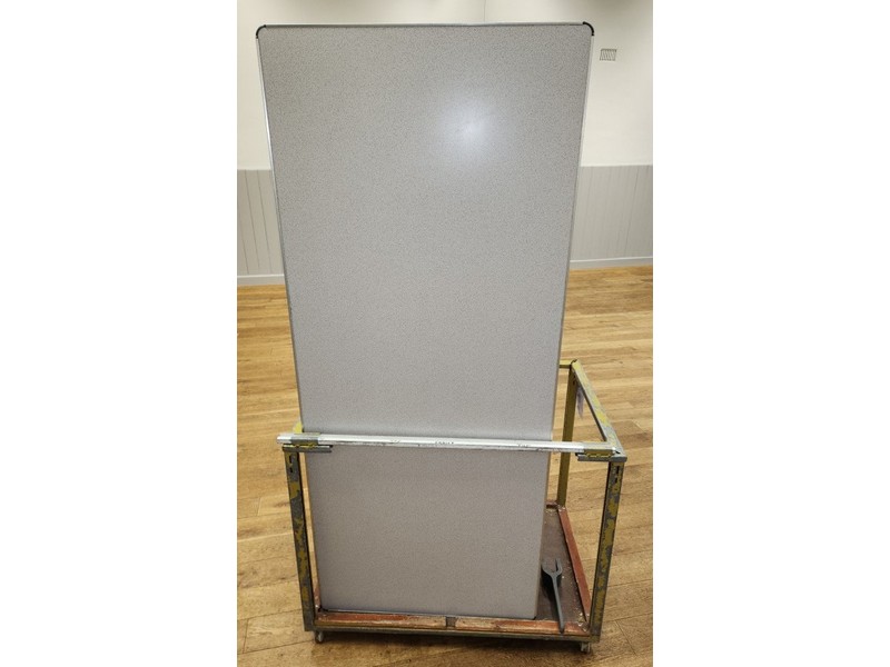 Large folding tables on a trolley