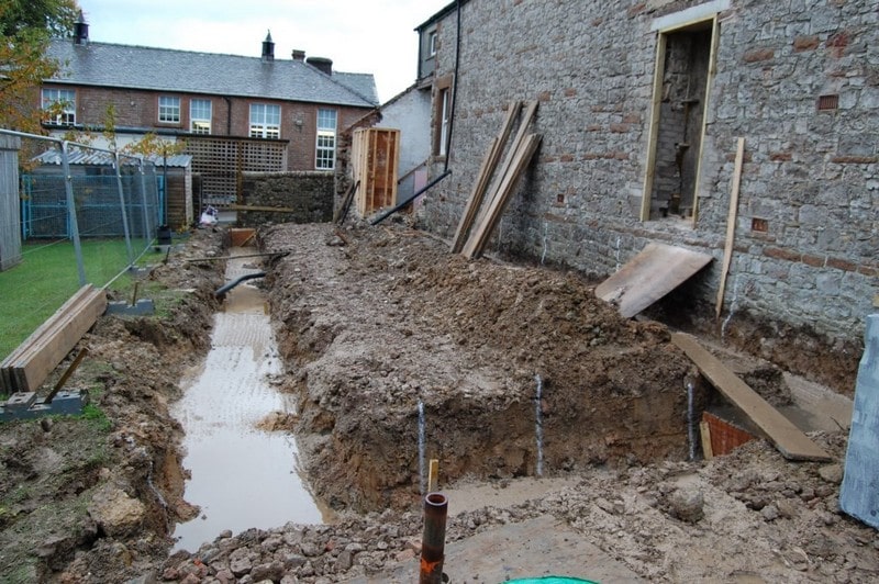 Foundations being dug for the village hall extension