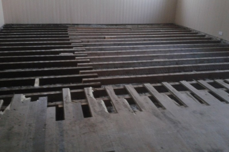 The old flooring in the main hall being taken up