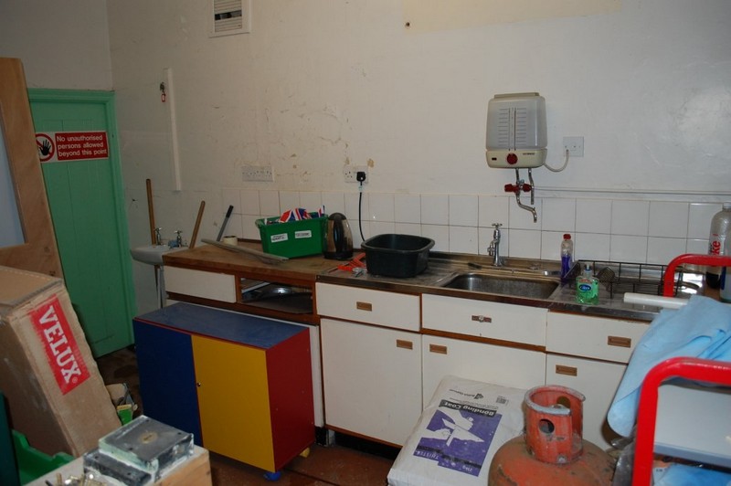 The old kitchen, with the store door to the rear.