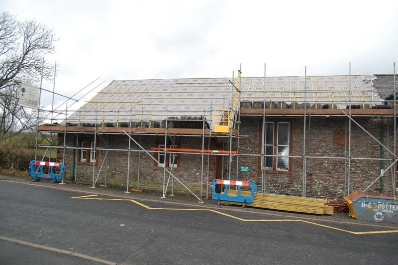 The roof was stripped of its slates and prepared for the PV tile installation.